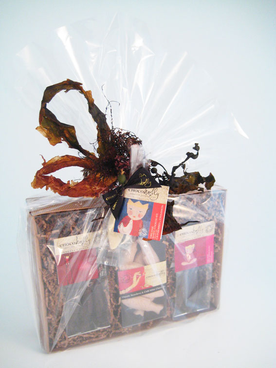 Cellophane wrap tied with a seaweed bow makes this hamper look delightful